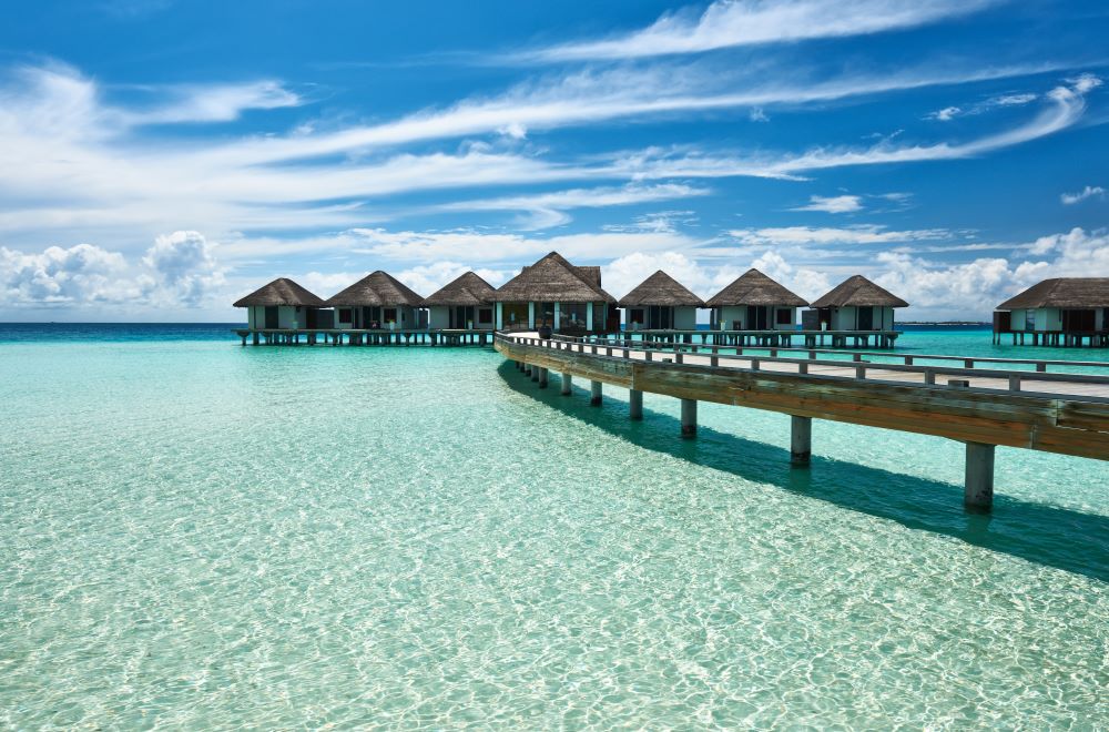 beautiful beach with water bungalows 2023 11 27 05 27 34 utc